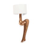 sculptural solid wood wall lighting illuminated in modern interior