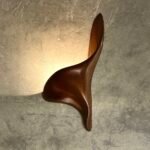 sculptural solid wood modern wall lighting collection by Amorph