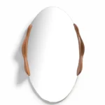 natural solid wood grain detail on sculptural Ovate mirror frame