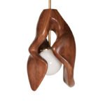 architectural profile of sculptural solid wood pendant light