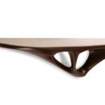 sculptural solid wood base detail of Una console
