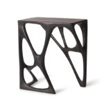 architectural profile of sculptural solid wood table