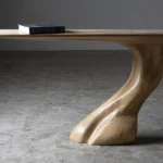 Solid wood sculptural furniture artwork by Amorph Studio
