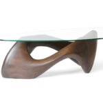 modern sculptural solid wood coffee table from angled perspective