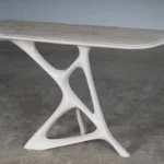 sculptural console table with stone top