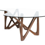 modern sculptural solid wood dining table from angled perspective