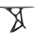 modern sculptural solid wood console table from angled perspective