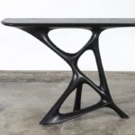 sculptural solid wood console table Anika by Amorph