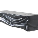 solid wood sculptural door detail of Ocean wall mounted cabinet