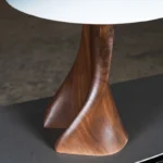 sculptural wood table lamp Nile illuminated by Amorph