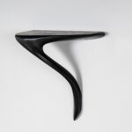 sculptural solid wood underside detail of Yena wall mounted console