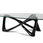 modern sculptural solid wood coffee table from angled perspective