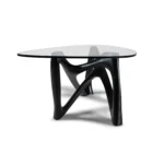 solid wood surface detail of Walenty sculptural coffee table Walenty by Amorph