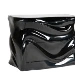 modern sculptural solid wood nightstand from angled perspective