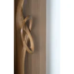 organic handle detail of sculptural wood interior door Flow by Amorph