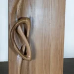 custom sculptural wood interior door Flow installed in modern interior by Amorph