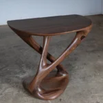 sculptural wood console table angled view Kova by Amorph