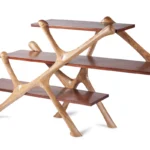 modern sculptural solid wood bookcase from angled perspective