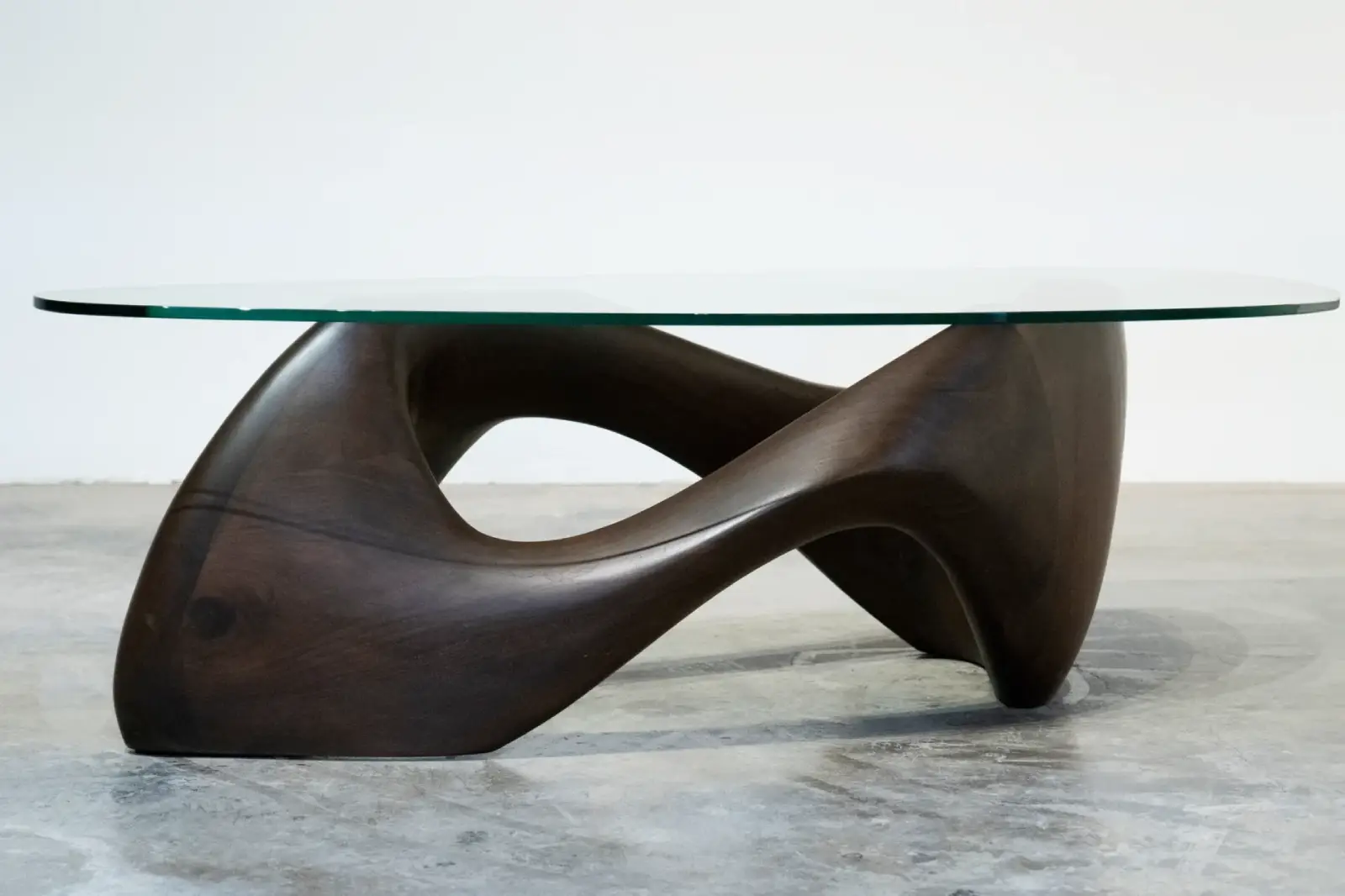 sculptural solid wood coffee table Lust by Amorph